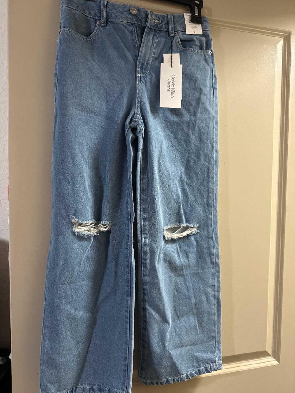 Calvin Klein jeans kids size 12 high rise, wide leg new with tag